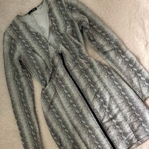 Snake print body con dress